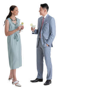 two people standing and drinking cocktails