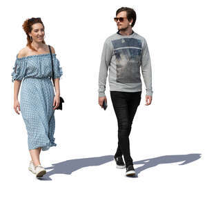man and woman walking on a sunny day