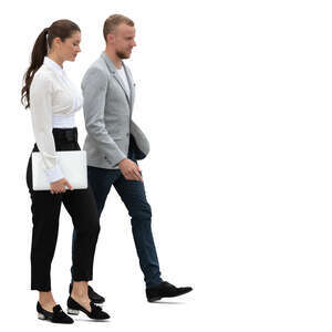 businessman and businesswoman walking side by side