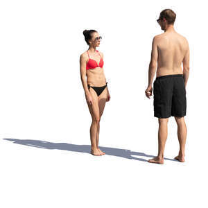 man and woman standing at the beach and talking