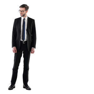 man in a black suit standing