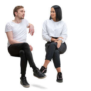 man and woman sitting and talking