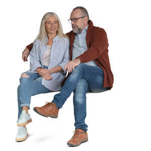 elderly couple sitting and talking