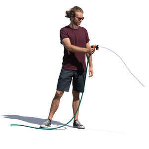young man watering plants