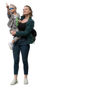 woman standing and holding a little boy