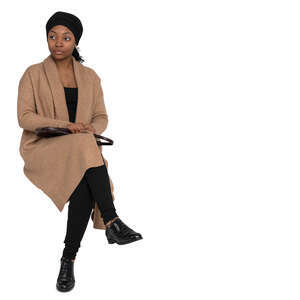 cut out black muslim woman sitting
