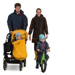 cut out family with two kids walking on a autumn day