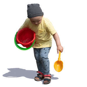 cut out little boy with a toy bucket playing