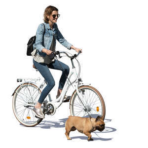 cut out woman riding a bike with a dog running beside her