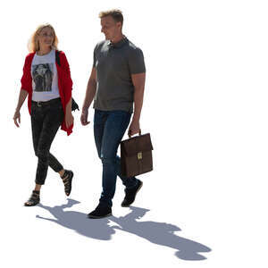cut out backlit man and woman walking on the street and talking