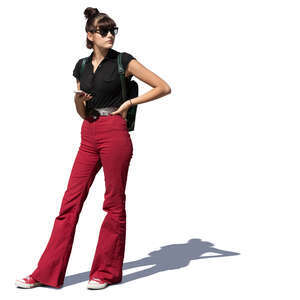 cut out young woman standing with a phone in her hand