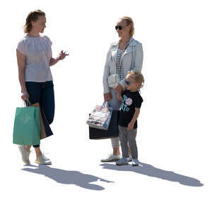 two cut out women and a little boy standing and talking
