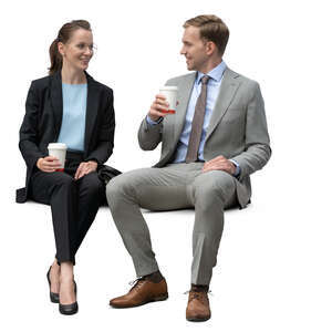 two business collegues sitting and drinking coffee
