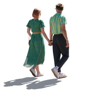 cut out young backlit couple walking hand in hand
