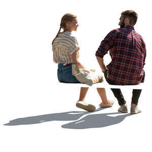 cut out backlit man and woman sitting seen from back angle