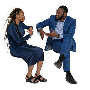 cut out man and woman sitting and talking