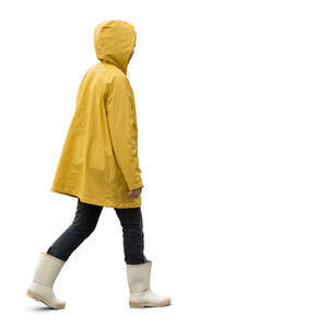 cut out woman in a yellow rain coat walking