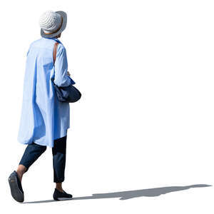 cut out woman in a light blue overcoat walking