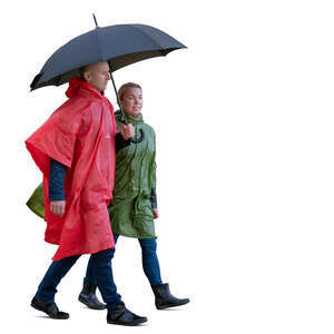 cut out man and woman wearing raincoats walking under un umbrella