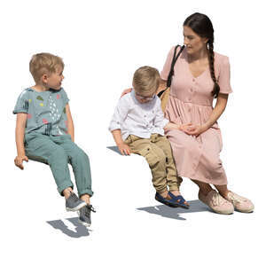 cut out woman and her two sons sitting and talking