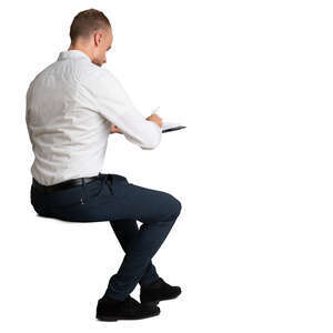cut out man sitting at a table and writing