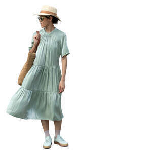 cut out asian woman in a green summer dress standing
