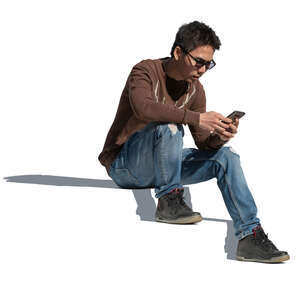cut out man sitting on the stairs with a phone in his hand