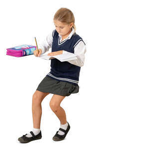 cut out schoolgirl sitting at a desk and writing