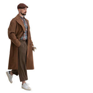 cut out man in a brown overcoat walking