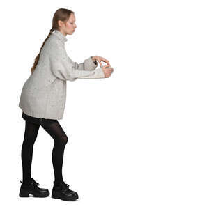 cut out woman standing at a counter and drinking coffee