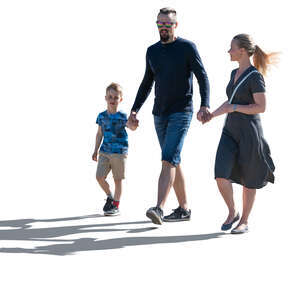 cut out backlit family of three walking