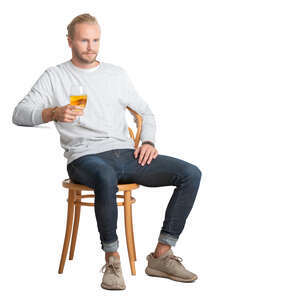 cut out man sitting and drinking beer
