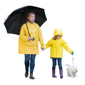 cut out mother and daughter and a dog walking in the rain