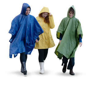 three cut out women in raincoats walking on a rainy day