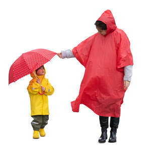 cut out woman and her little walking on a rainy day 