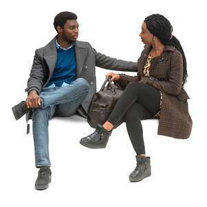 cut out man and woman sitting and talking