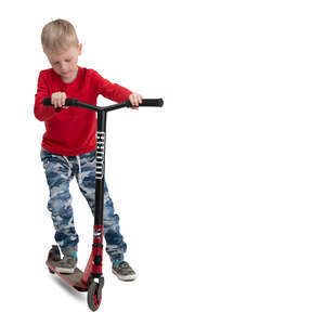 cut out little boy riding a scooter