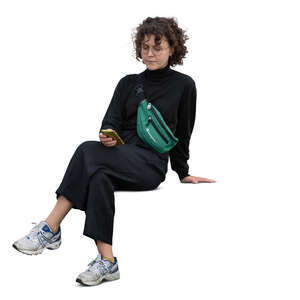 cut out young woman with a phone in her hand sitting