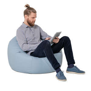 cut out man sitting in a bean bag chair and holding a tablet