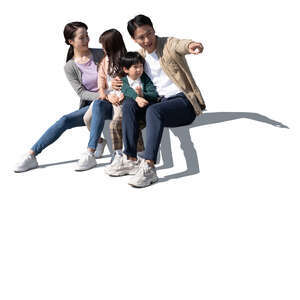 cut out chinese family with two kids sitting and looking at smth