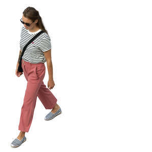 cut out young woman walking seen from above