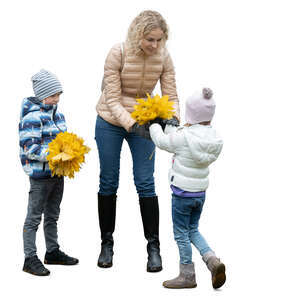 two cut out kids and their mother picking leaves in the park