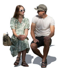 cut out man and woman sitting in a patial shade