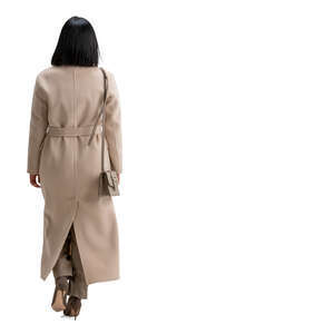 cut out woman in a long brown overcoat walking