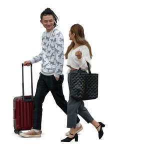 two cut out young asian people with travelling bags walking
