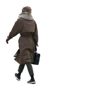 cut out woman in a brown overcoat walking