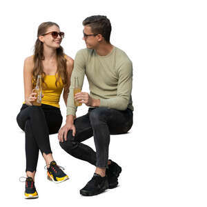cut out man and woman sitting and drinking soft drinks