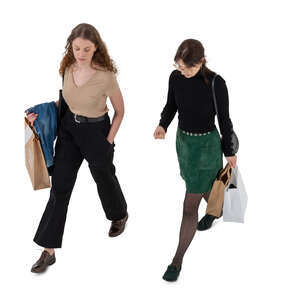 two cut out women with shopping bags walking seen from above