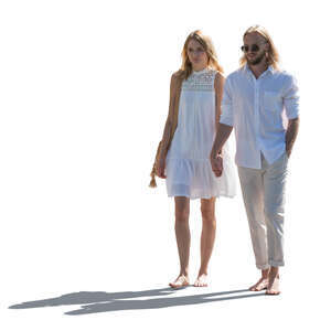 cut out backlit couple in white resort clothes walking