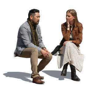 cut out man and woman sitting and talking